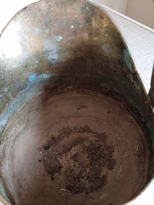 Antique brass coal scuttle helmet in need of TLC