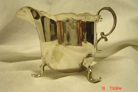 STUNNING SILVER PLATED CREAMER