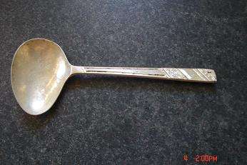 FEEDING SPOON SILVER????