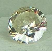 DIAMOND  - 0.10 CARAT TOP LIGHT BROWN SI2 ROUND BRILLIANT LOOSE DIAM