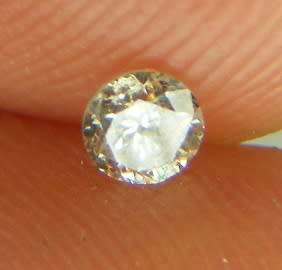 DIAMOND  - 0.11 CARAT TOP LIGHT BROWN, I1  ROUND BRILLIANT DIAMOND 3.05 x1.79mm