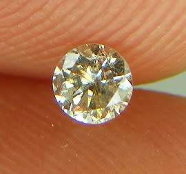 DIAMOND  - 0.11 CARAT TOP LIGHT BROWN, I1  ROUND BRILLIANT DIAMOND 3.05 x1.79mm