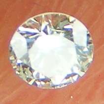 DIAMOND  - 0.04 CARAT TOP LIGHT BROWN, SI1  ROUND BRILLIANT DIAMOND 2.15x1.25mm