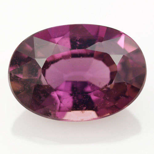 SAPPHIRE- UNHEATED OVAL PURPLE BROWN SAPPHIRE 0.85 CT