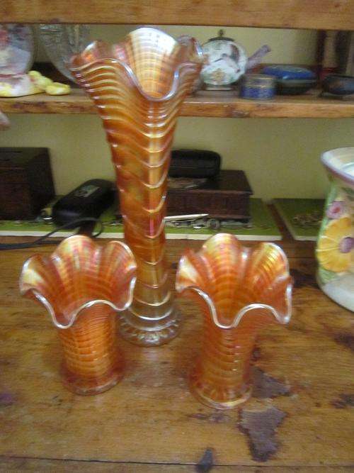 Carnival glass vase trio