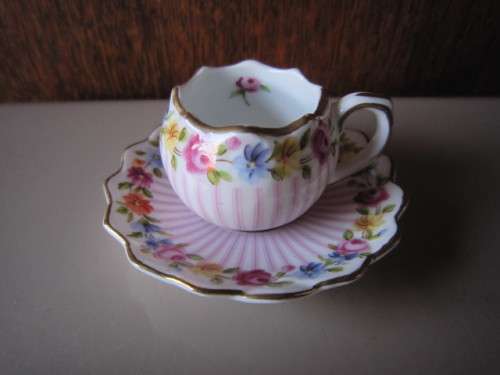 MINIATURE "ORCHID " CUP AND SAUCER  ITEM NO 2214