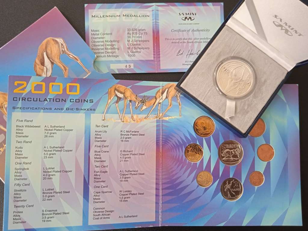 2000 coin set and Millennium Madallion