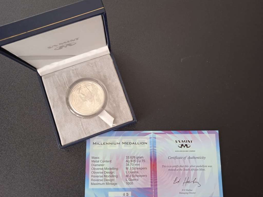 2000 coin set and Millennium Madallion