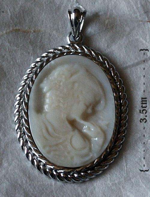 CAMEO MOTHER OF PEARL WITH STERLING SILVER FRAME