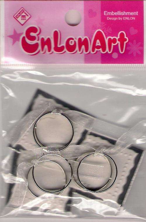 CLEARANCE SALE!!!!!!!! Beautifull Embelishments .-Chipboard with silver rings