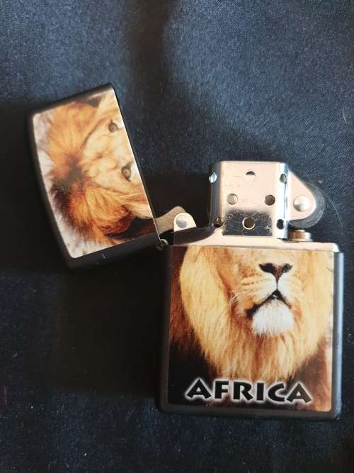 Brand new Zippo lighter in box 218 African lion