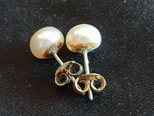 Sterling silver earrings with genuine pearls