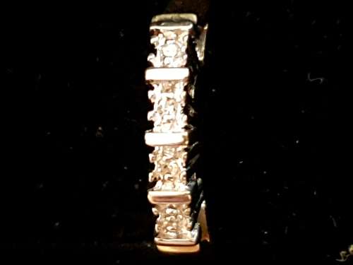 4 diamond 9ct yellow and white gold Eternity ring