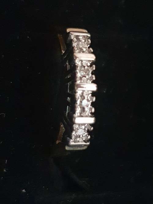 4 diamond 9ct yellow and white gold Eternity ring