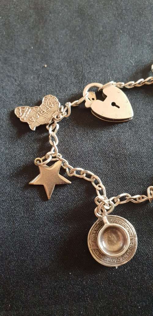 Sterling silver charm bracelet with Sterling silver charms