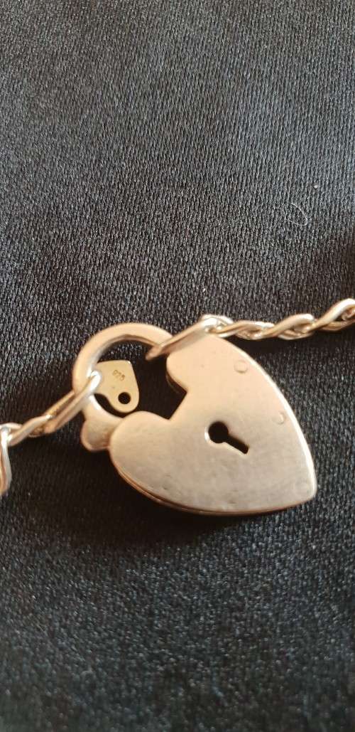 Sterling silver charm bracelet with Sterling silver charms