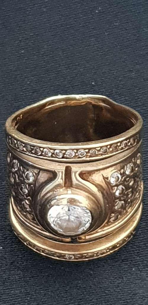 9ct yellow gold and large C.Z broad style band ring with 2 channel set rings either side -joined