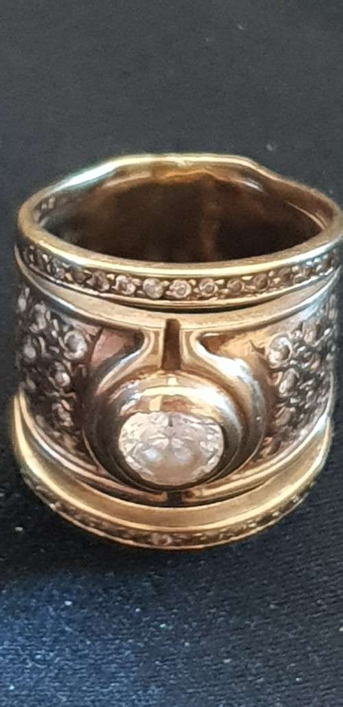 9ct yellow gold and large C.Z broad style band ring with 2 channel set rings either side -joined