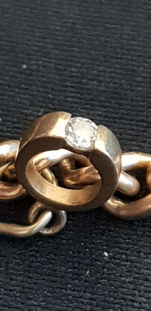 9ct gold charm bracelet with 5 charms attached