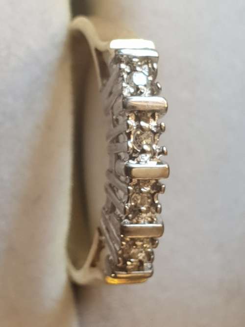 4 diamond 9ct yellow and white gold Eternity ring