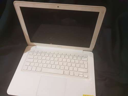 APPLE MAC BOOK LAPTOP WITH ORIGINAL CHARGER