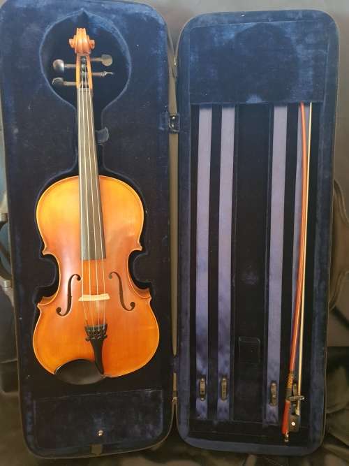 Viola Standler in case with bow