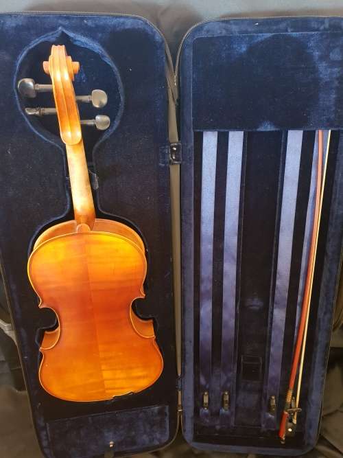 Viola Standler in case with bow