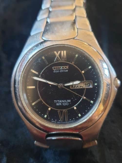 Citizen  Eco-drive W100 titanium black dial watch