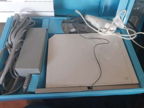 Wii console with Wii fit mat and game,1 control.1 nunchaka and Wii move dance mat