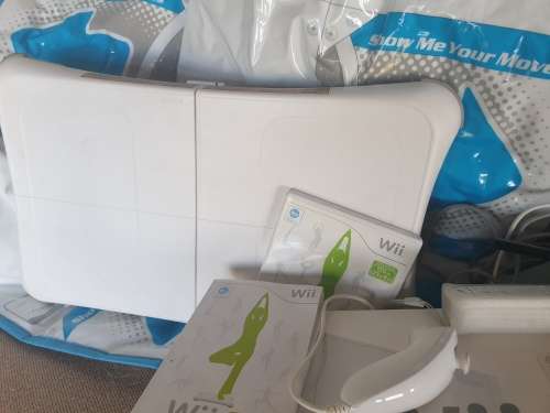 Wii console with Wii fit mat and game,1 control.1 nunchaka and Wii move dance mat