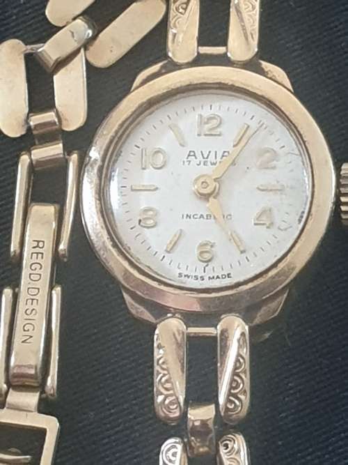 Avia ladies 17 Jewel Inca-block- solid 9ct gold watch casing and strap