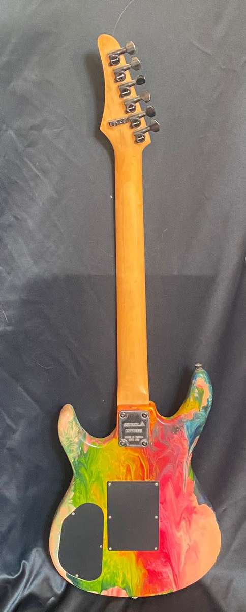 Samick solid body electric guitar-multi coloured marble effect