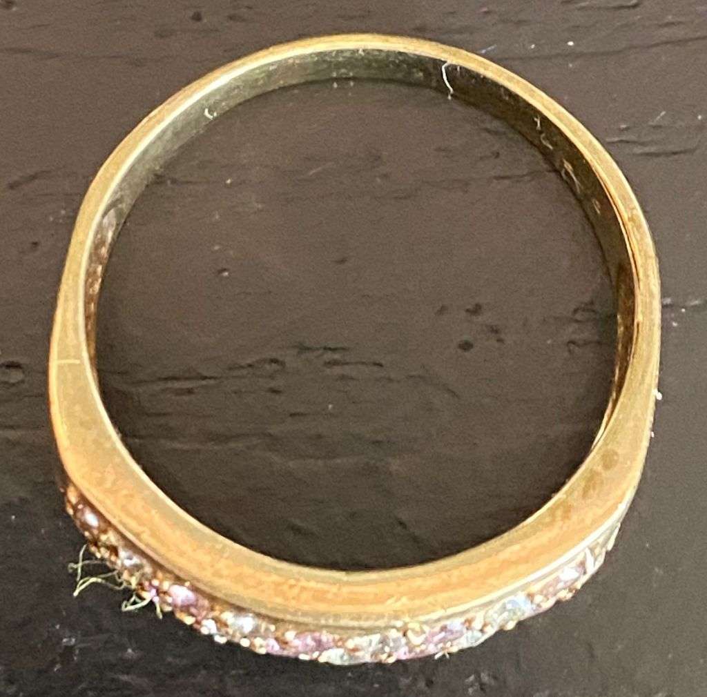 Pretty 9ct yellow gold with 3 rows channel band setting of pink and white stone ring