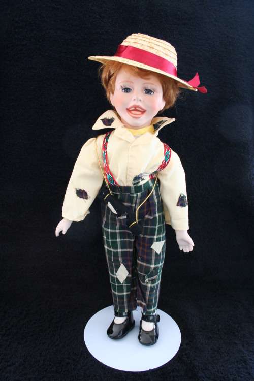 PORCELAIN BOY/GIRL  DOLL--FULLY DRESSED WITH STAND