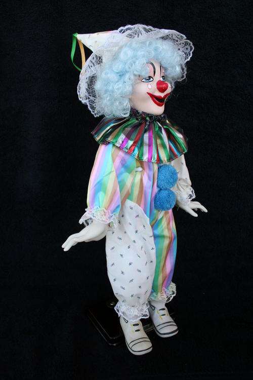 PORCELAIN CLOWN DOLL--FULLY DRESSED WITH STAND