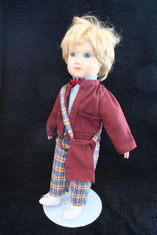 PORCELAIN BOY/GIRL  DOLL--FULLY DRESSED WITH STAND