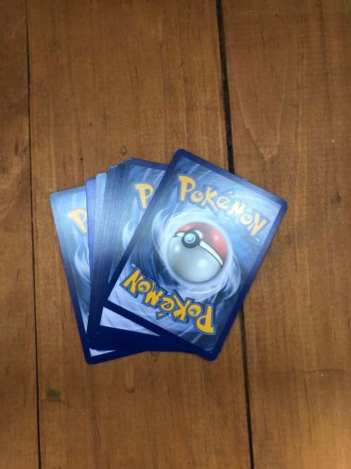Lot of 10 Pokémon cards including 1 rare holo card