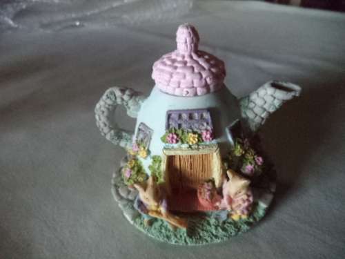 Cute Little Teapot With a family of Mice