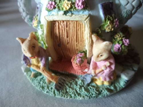 Cute Little Teapot With a family of Mice