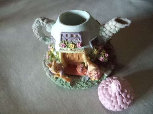Cute Little Teapot With a family of Mice