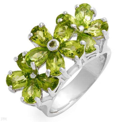 **R2 150.00** Fashionable Ring With 5.24ctw Genuine Peridots Made in 925 Sterling silver.