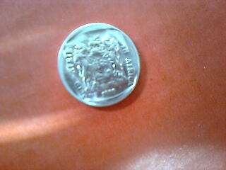 A VERY ODD STRUCKED R2 COIN - ERROR?