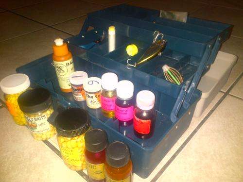 large tackle box with lots of extras
