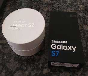 As new Samsung Galaxy S7 Smart phone with Samsung Gear S2 Smart watch