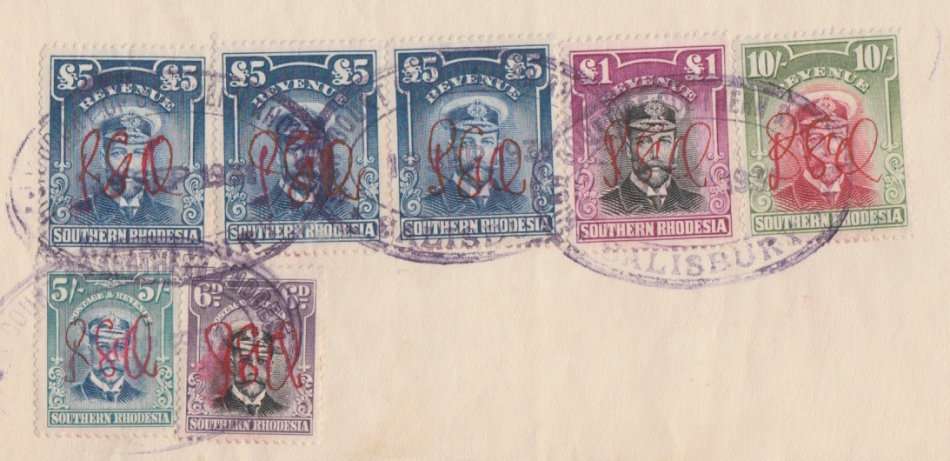 3 x Admiral £5,  £1 black and magenta,  10/ carmine & green, 5/ blue - green and 6d mauve.