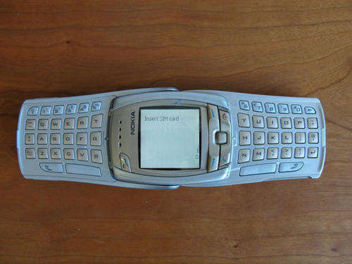 Nokia 6810 with original charger.