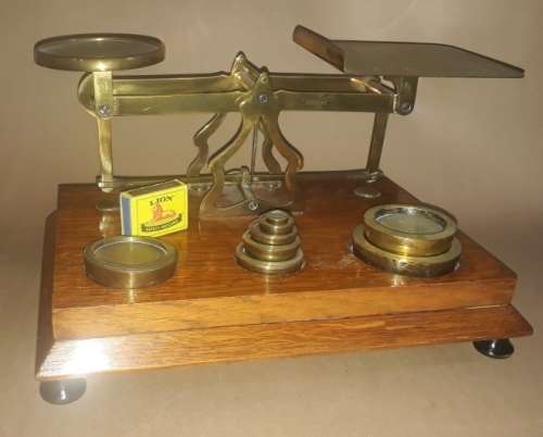 Antique Brass and Wood Postal Scale with 8 Weights