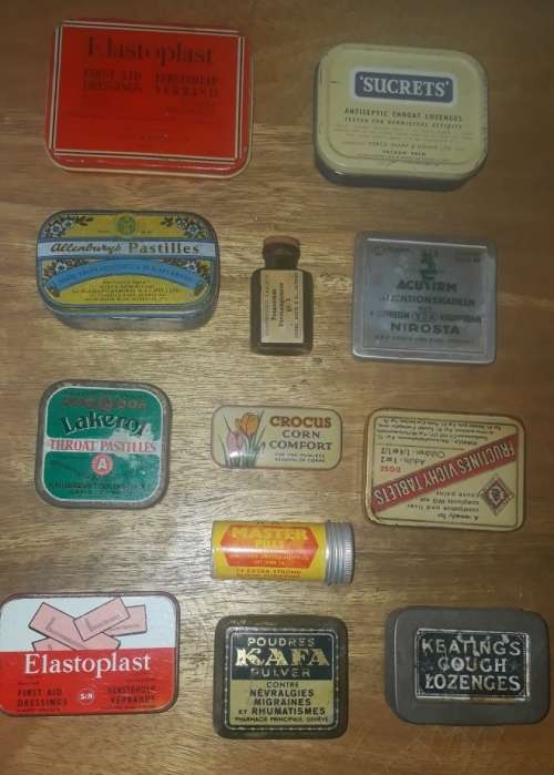 A selection of 11 Vintage Medicine Tins and One Small Bottle of Tablets