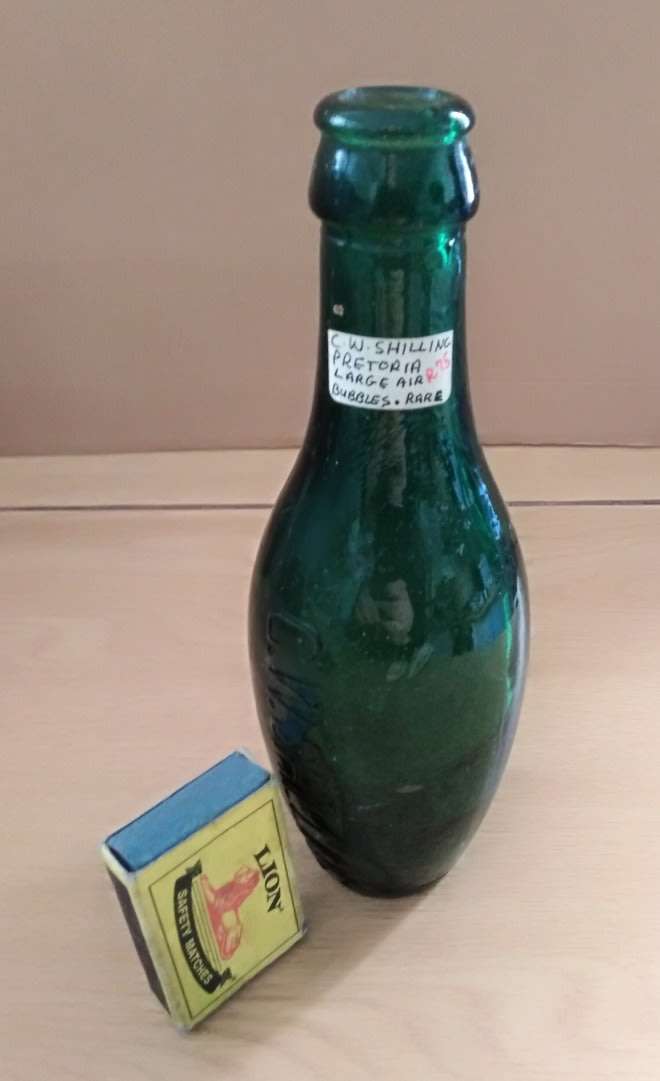 Antique Bottle:  Green C W Shilling, Pretoria. Trapped Air Bubbles