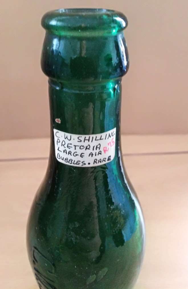Antique Bottle:  Green C W Shilling, Pretoria. Trapped Air Bubbles